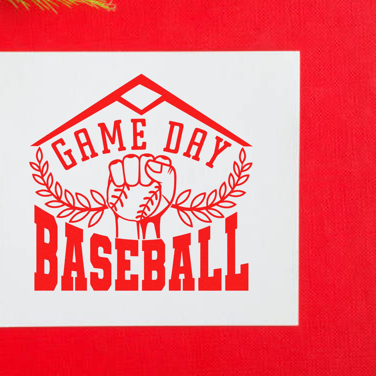 Red baseball stamp seal with fist, laurel wreath and house-roof logo reading Game Day Baseball on white background.