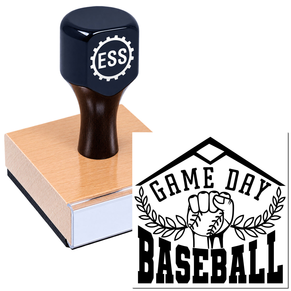 Dark navy ESS rubber stamp on wood block beside black Game Day Baseball seal with fist and laurel wreath