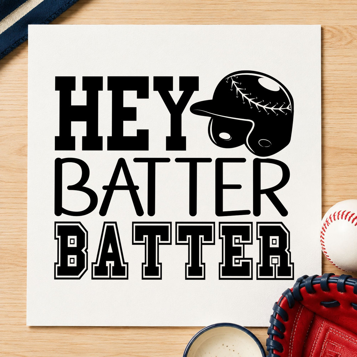 Hey Batter Batter craft stamp imprint in black ink on a handmade project, one idea being dugout scrapbook pages.