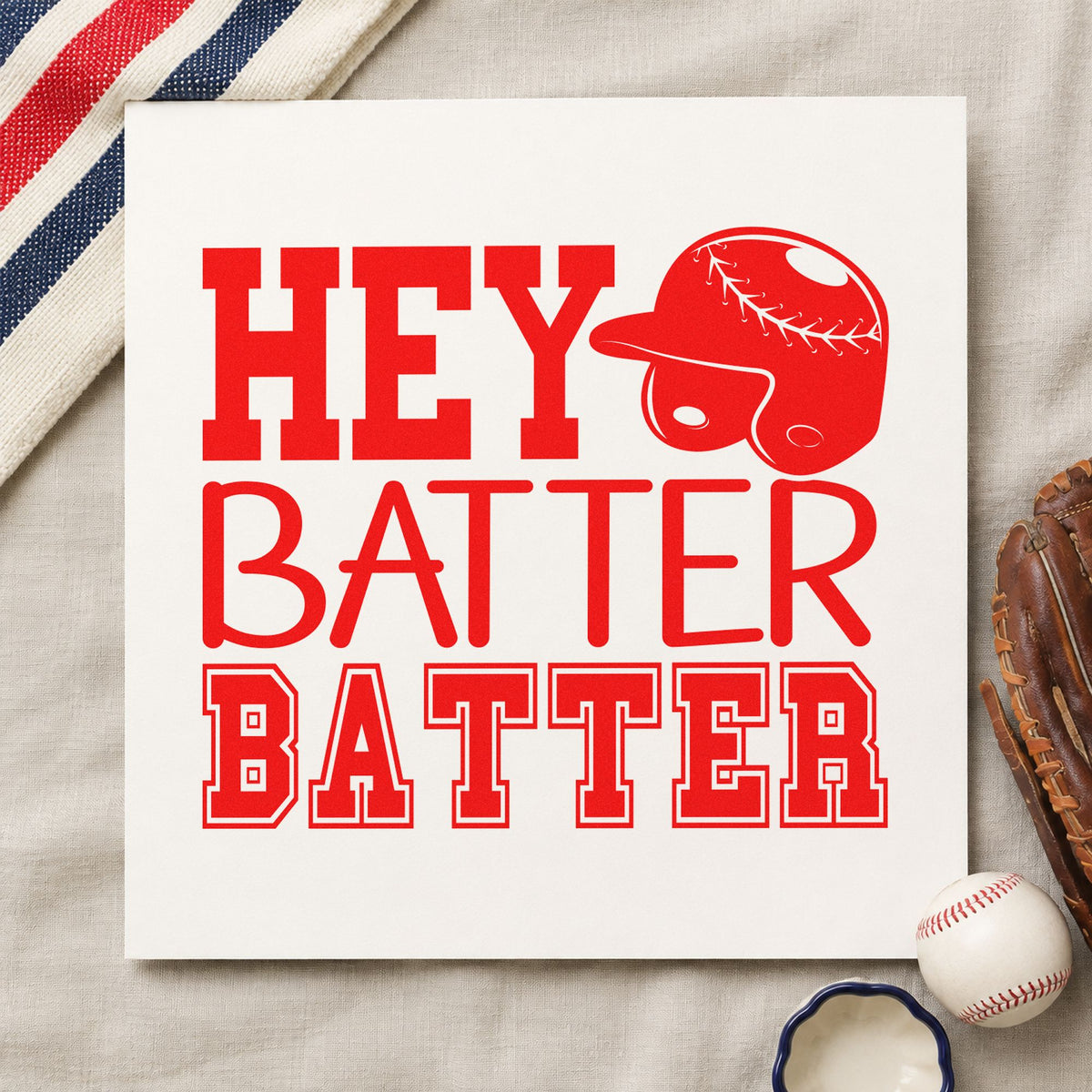 Hey Batter Batter rubber stamp shown in red ink, stamped for projects such as gift bag stamping.