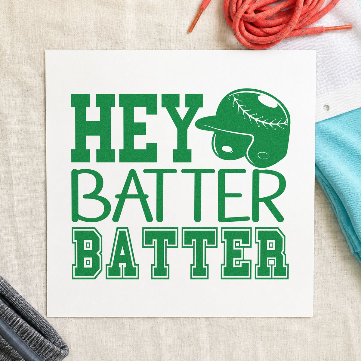 Hey Batter Batter craft stamp imprint in green ink on a handmade project, one idea being team name tags.