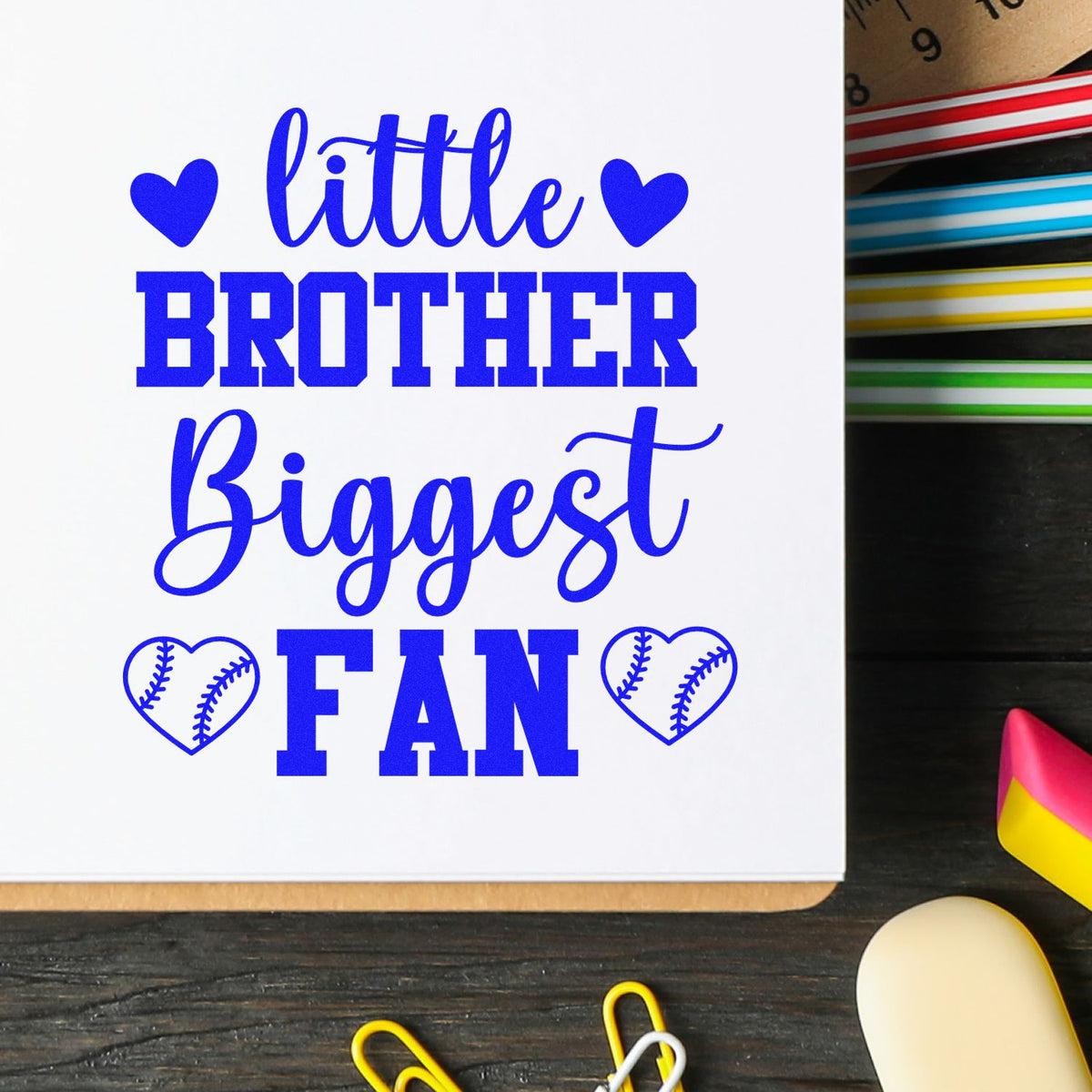 Blue Little Brother Biggest Fan stamp design with hearts and baseball stitches, beside colorful seal wax sticks.