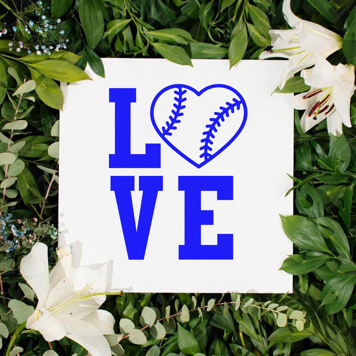 Blue baseball heart LOVE stamp-and-seal design on white square, framed by green leaves and white lilies.