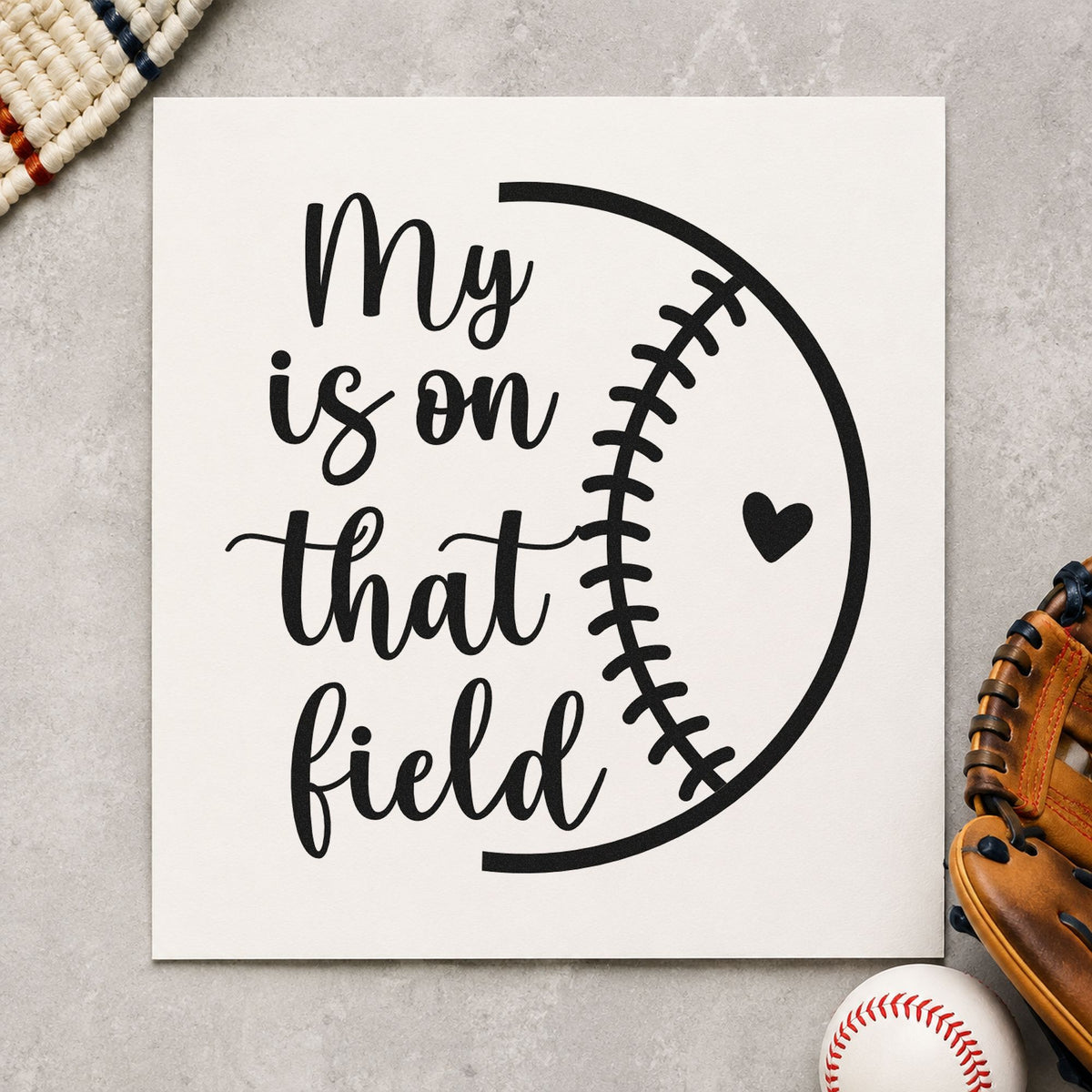 Heart on the Field Half Ball craft stamp imprint in black ink on a handmade project, one idea being photo mat stamping.