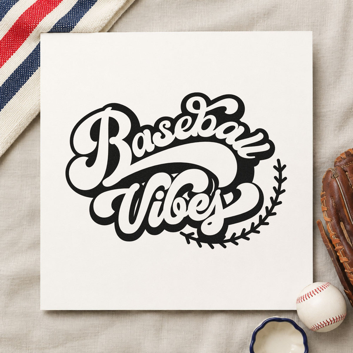 Baseball Vibes craft stamp imprint in black ink on a handmade project, one idea being tote bag printing.