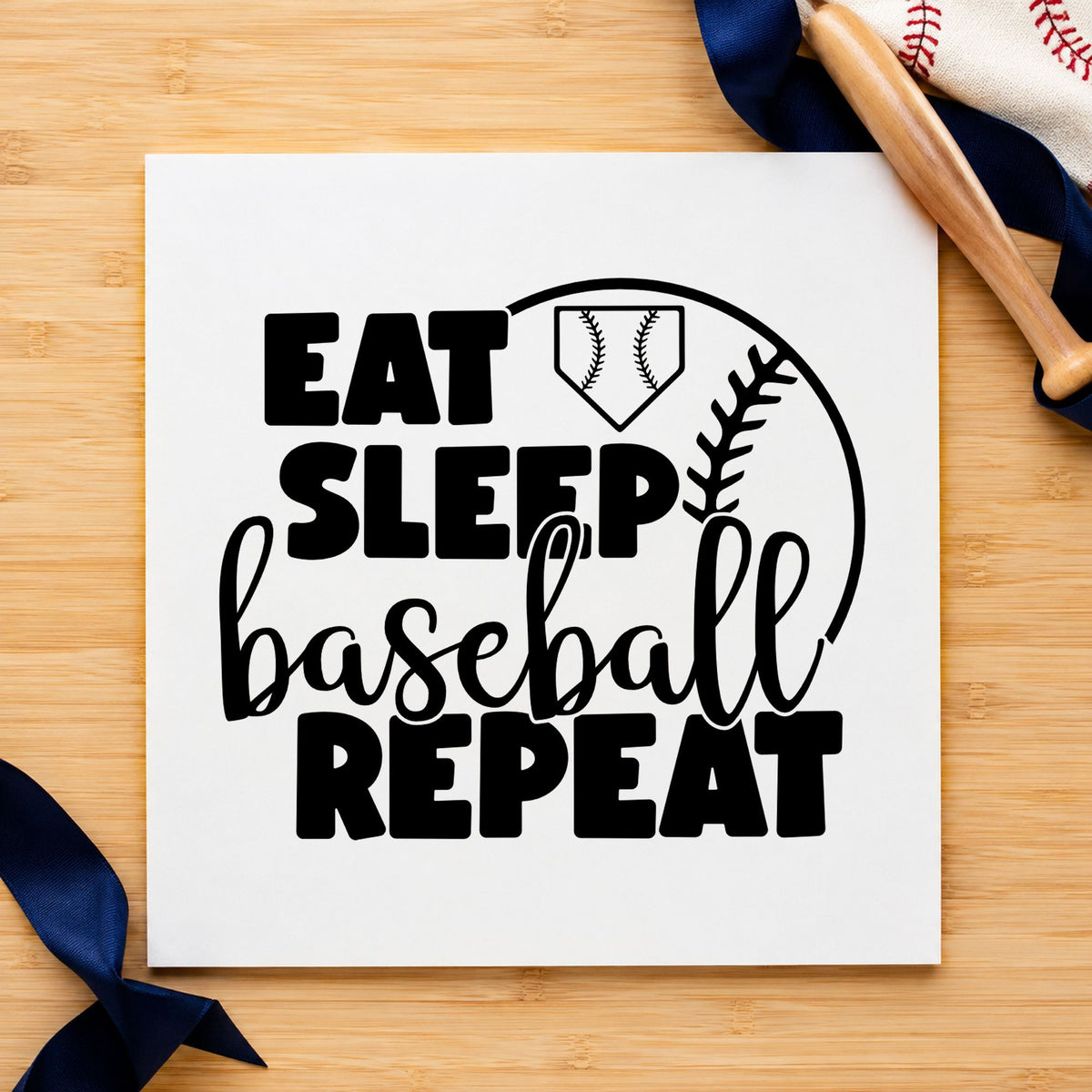 Eat Sleep Baseball Half Ball craft stamp imprint in black ink on a handmade project, one idea being practice journals.