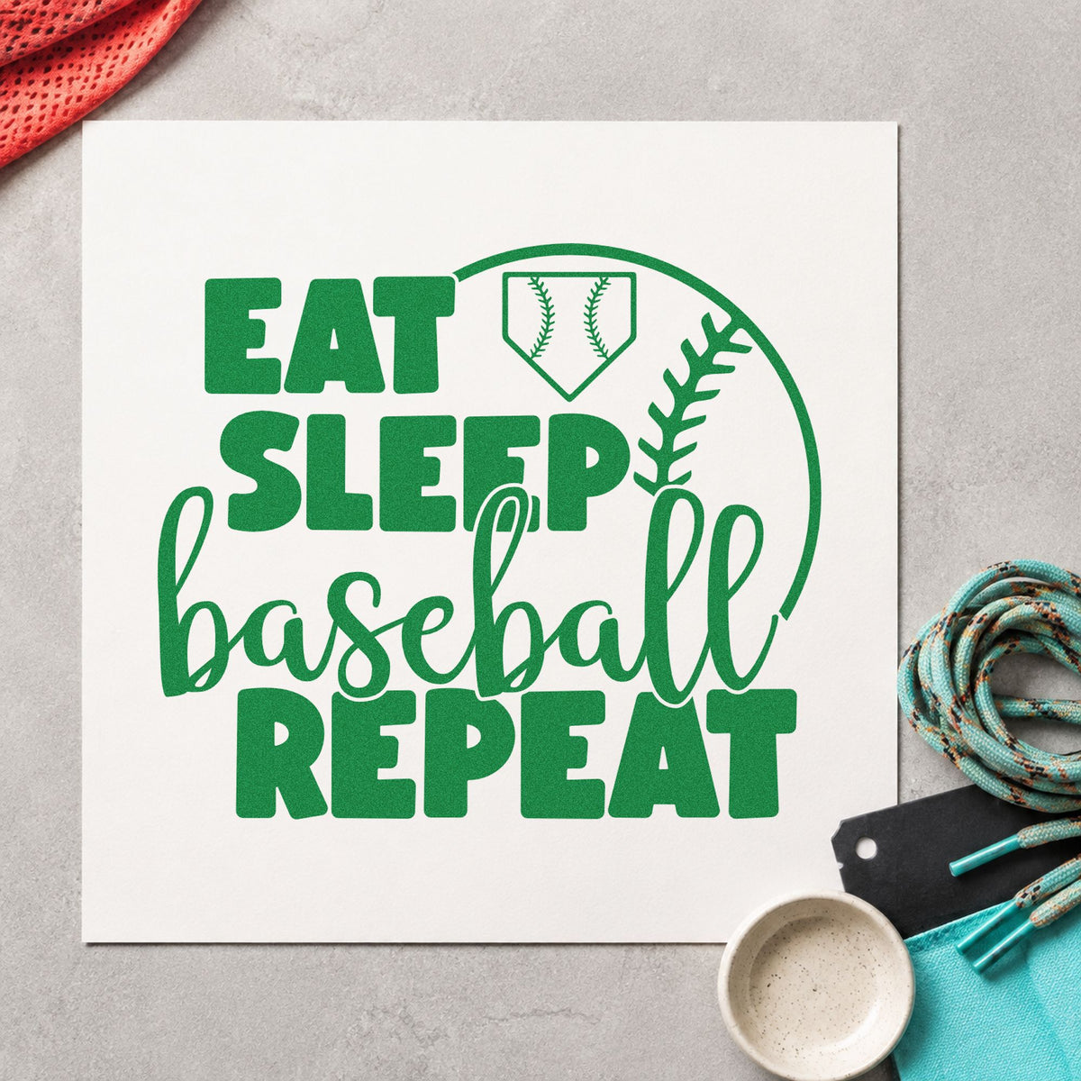 Eat Sleep Baseball Half Ball craft stamp imprint in green ink on a handmade project, one idea being snack bag labels.