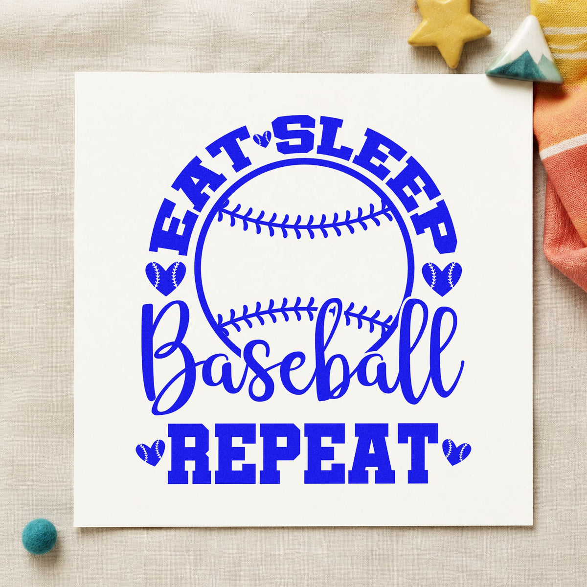 Eat Sleep Baseball Hearts craft stamp imprinted in blue ink on paper, a design suited to fan tote bags.