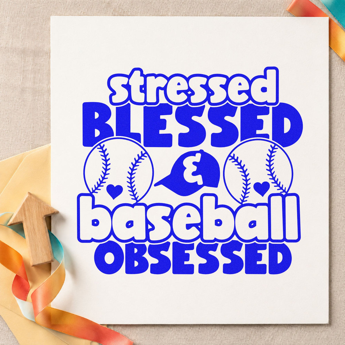 Stressed Blessed Baseball Obsessed craft stamp imprinted in blue ink on paper, a design suited to planner weekly headers.