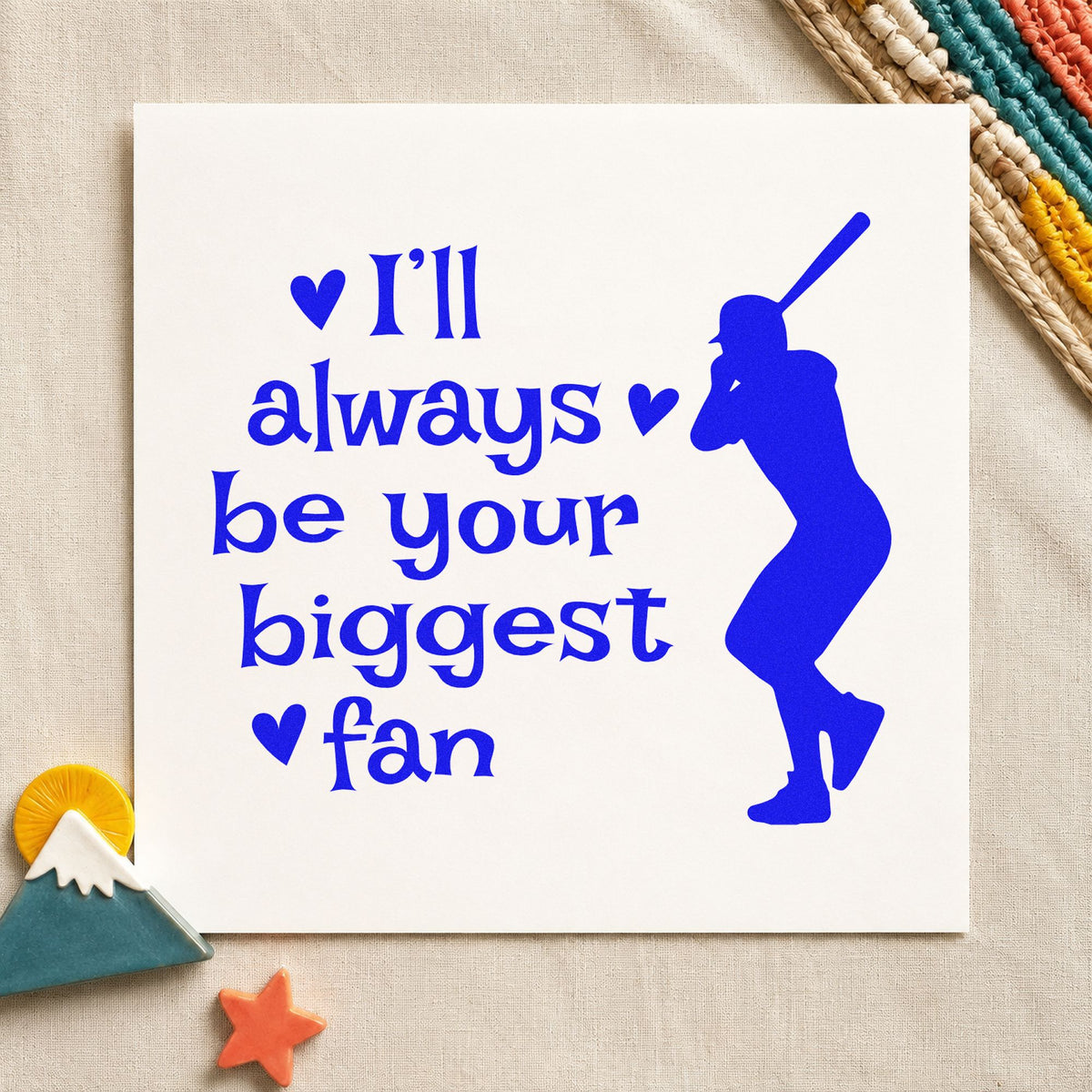 Biggest Fan Batter craft stamp imprinted in blue ink on paper, a design suited to fan tee transfers.