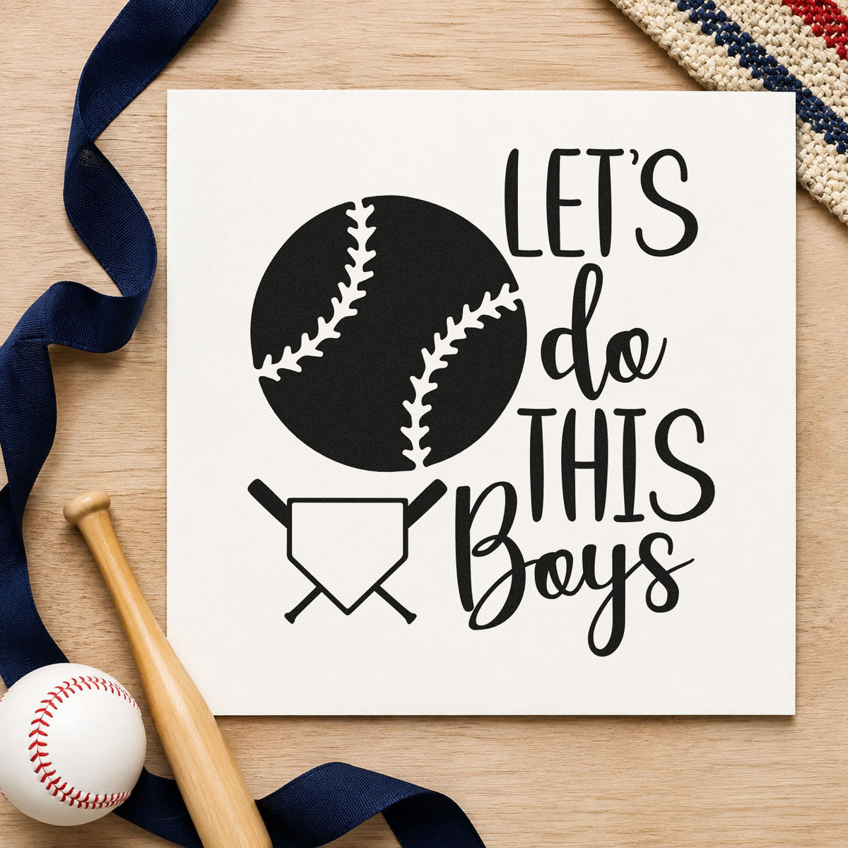 Let's Do This Boys Plate craft stamp imprint in black ink on a handmade project, one idea being scrapbook crest pages.