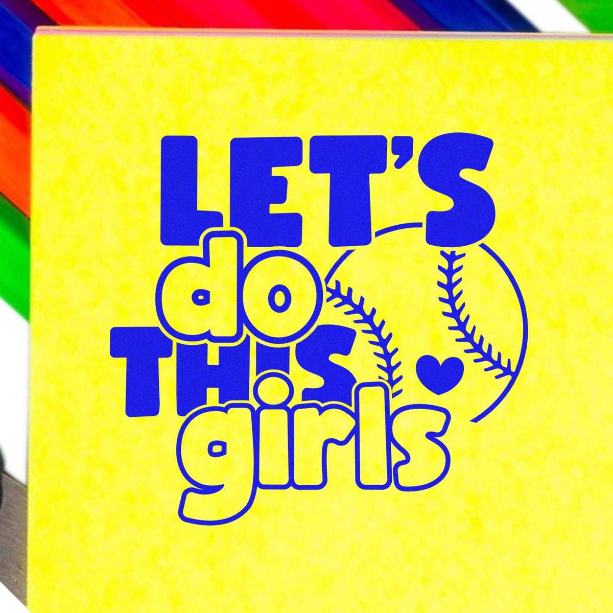 Yellow stamp and seal product box with blue LETS DO THIS girls text, baseball graphic, and rainbow stripes.