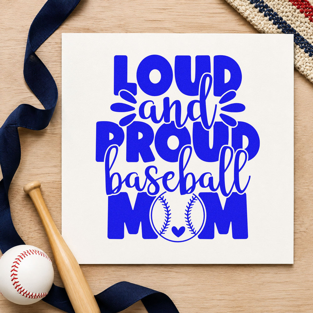 Proud Baseball Mom craft stamp in blue ink on cardstock, an easy option for stadium seat covers.