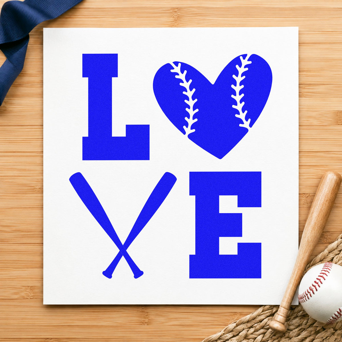 Baseball Heart and Bats Love craft stamp in blue ink on cardstock, an easy option for valentine cards.