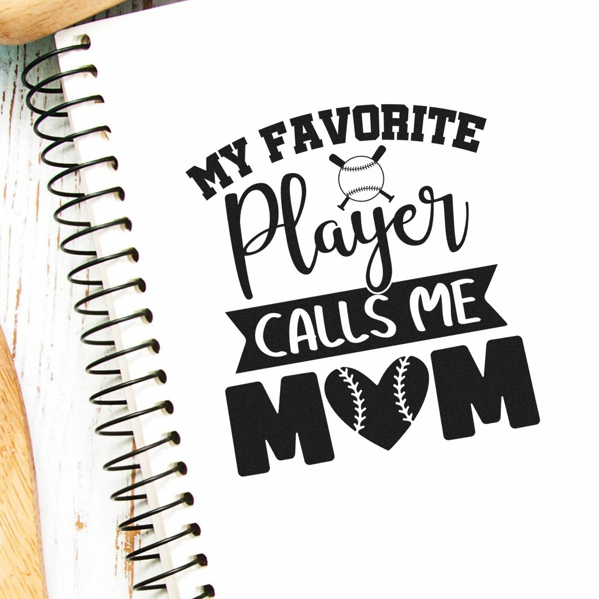 My Favorite Player Calls Me Mom Baseball Heart Premium Wooden Stamp - Vintage Pro imprint stamped in black ink. A baseball and stitched heart accent the phrase "My favorite player calls me mom."