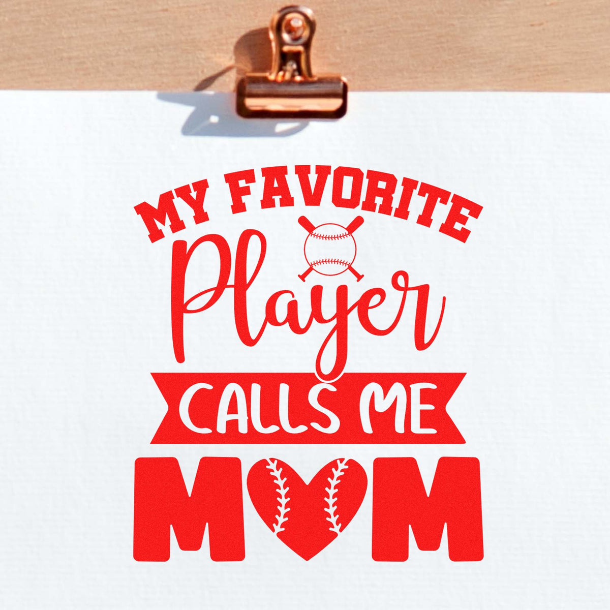 My Favorite Player Calls Me Mom rubber stamp shown in red ink, stamped for projects such as bleacher tees.