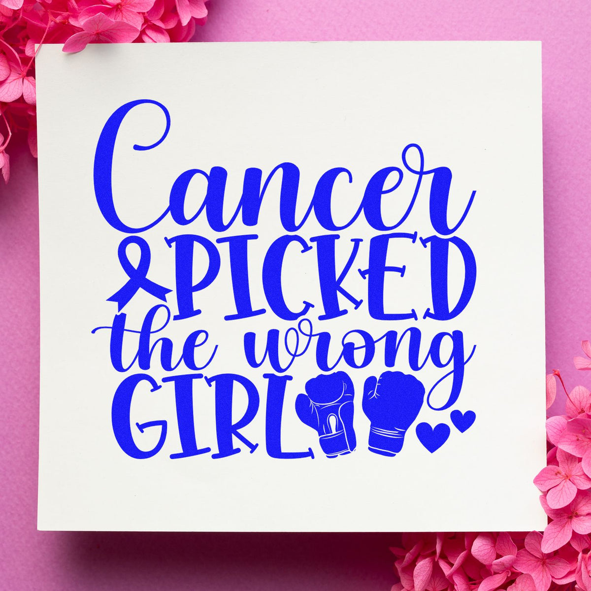 Blue custom stamp reading Cancer picked the wrong girl, with ribbon, boxing gloves and hearts on white card, pink flowers.