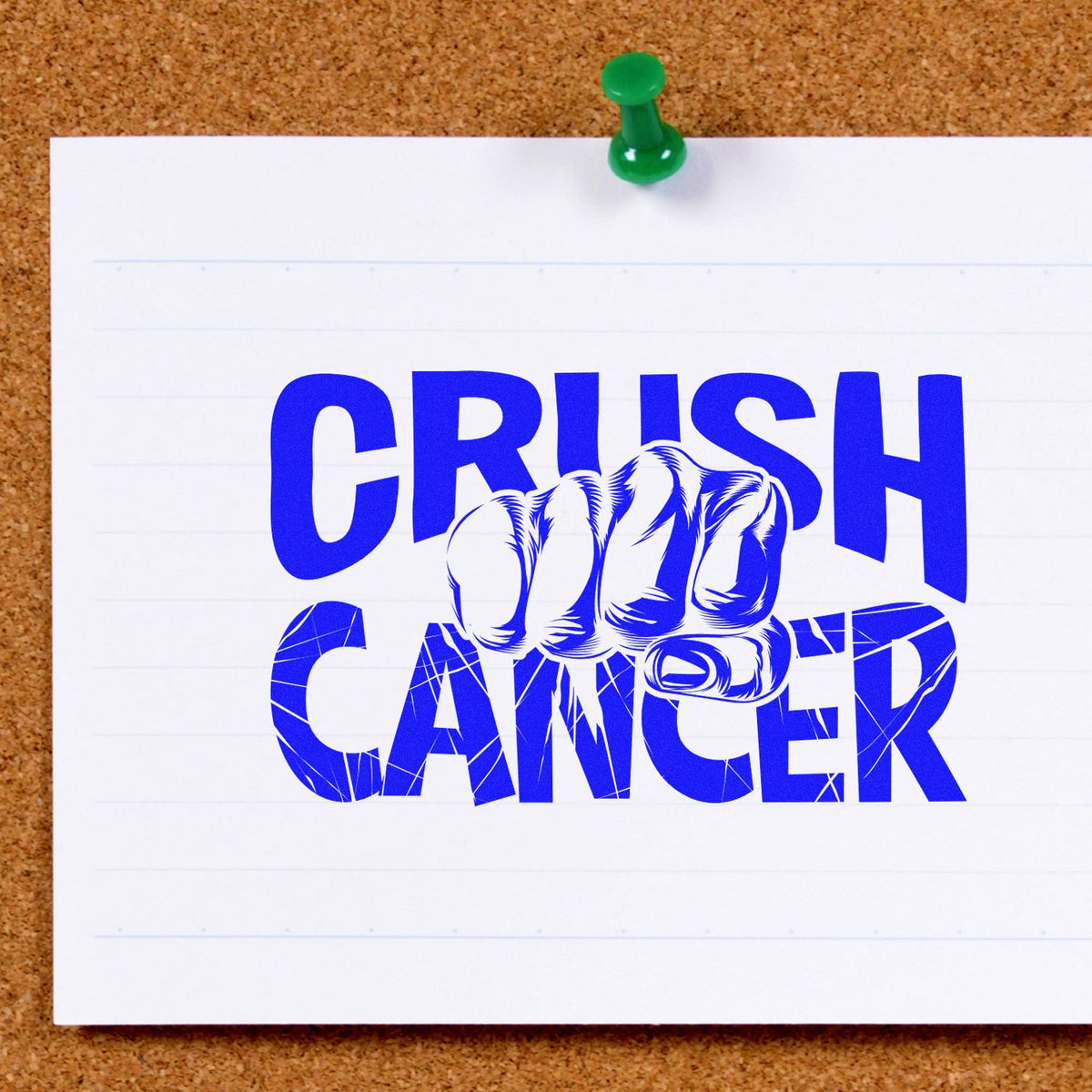 Blue CRUSH CANCER stamp-and-seal design with clenched fist, pinned on corkboard by a green pushpin.