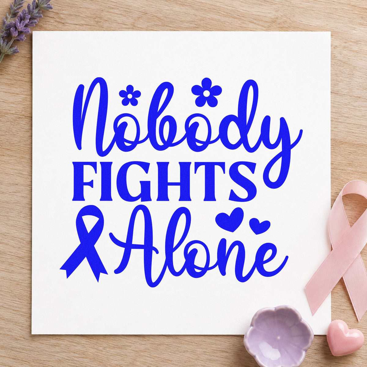 Nobody Fights Alone craft stamp imprinted in blue ink on paper, a design suited to group name tags.