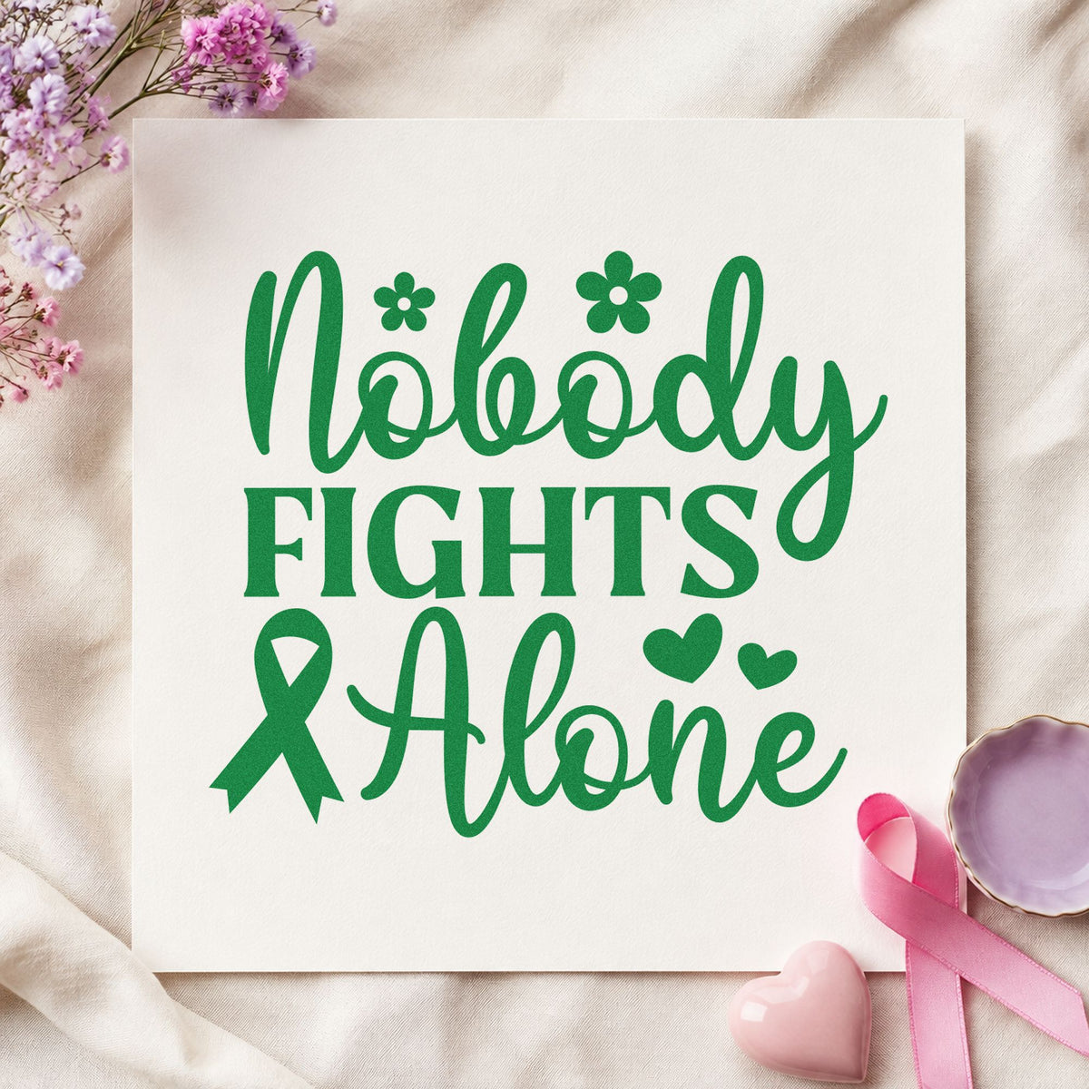 Nobody Fights Alone craft stamp imprint in green ink on a handmade project, one idea being awareness month crafts.