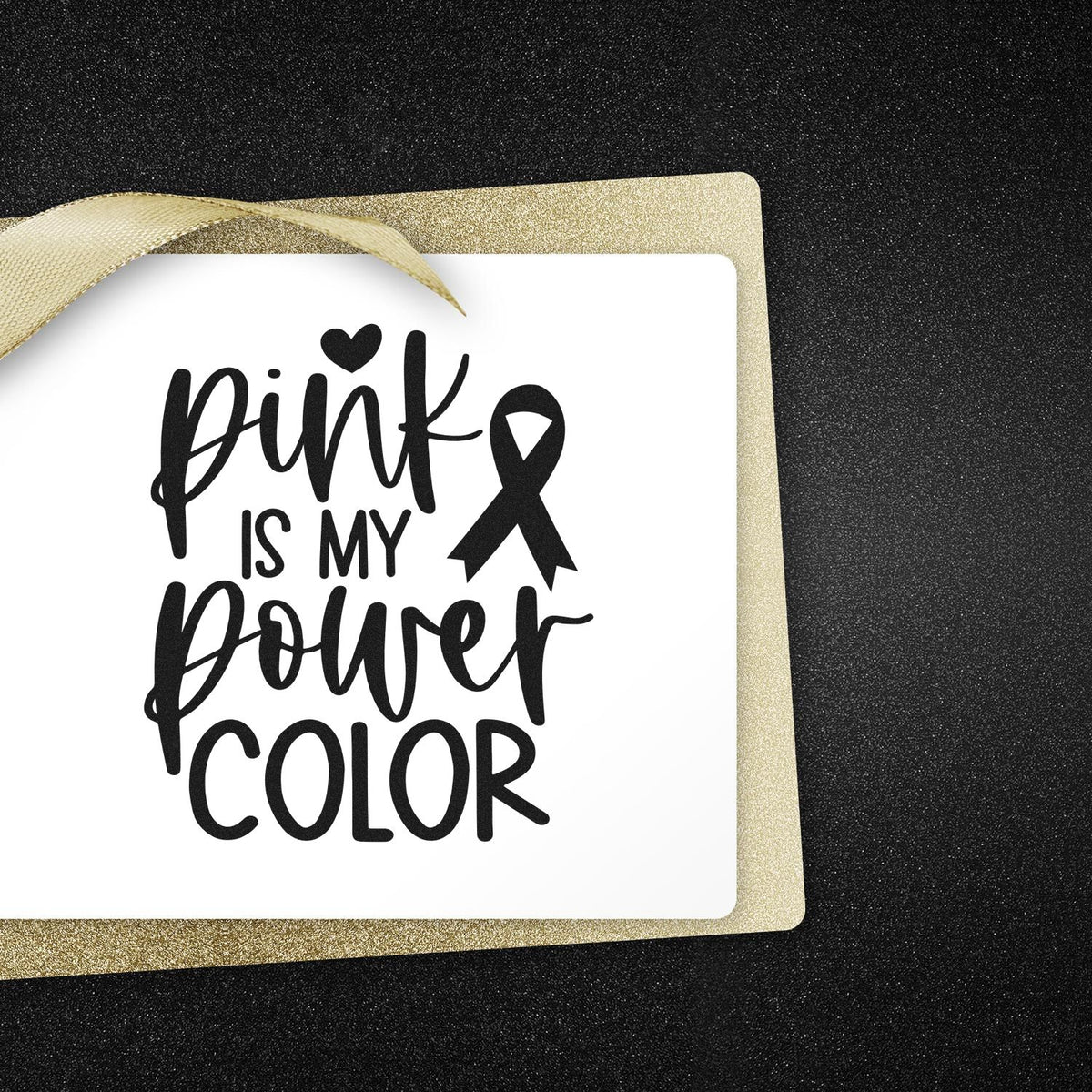 Pink is my power color stamp with black awareness ribbon on a white card, gold glitter border, and black sparkly background.