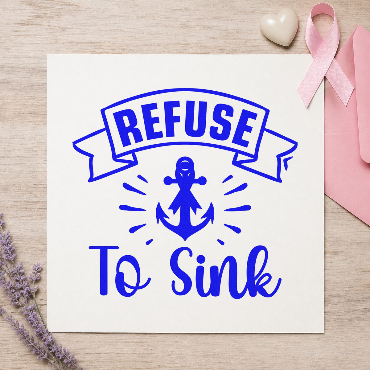 Refuse to Sink craft stamp in blue ink on cardstock, an easy option for beach house decor.