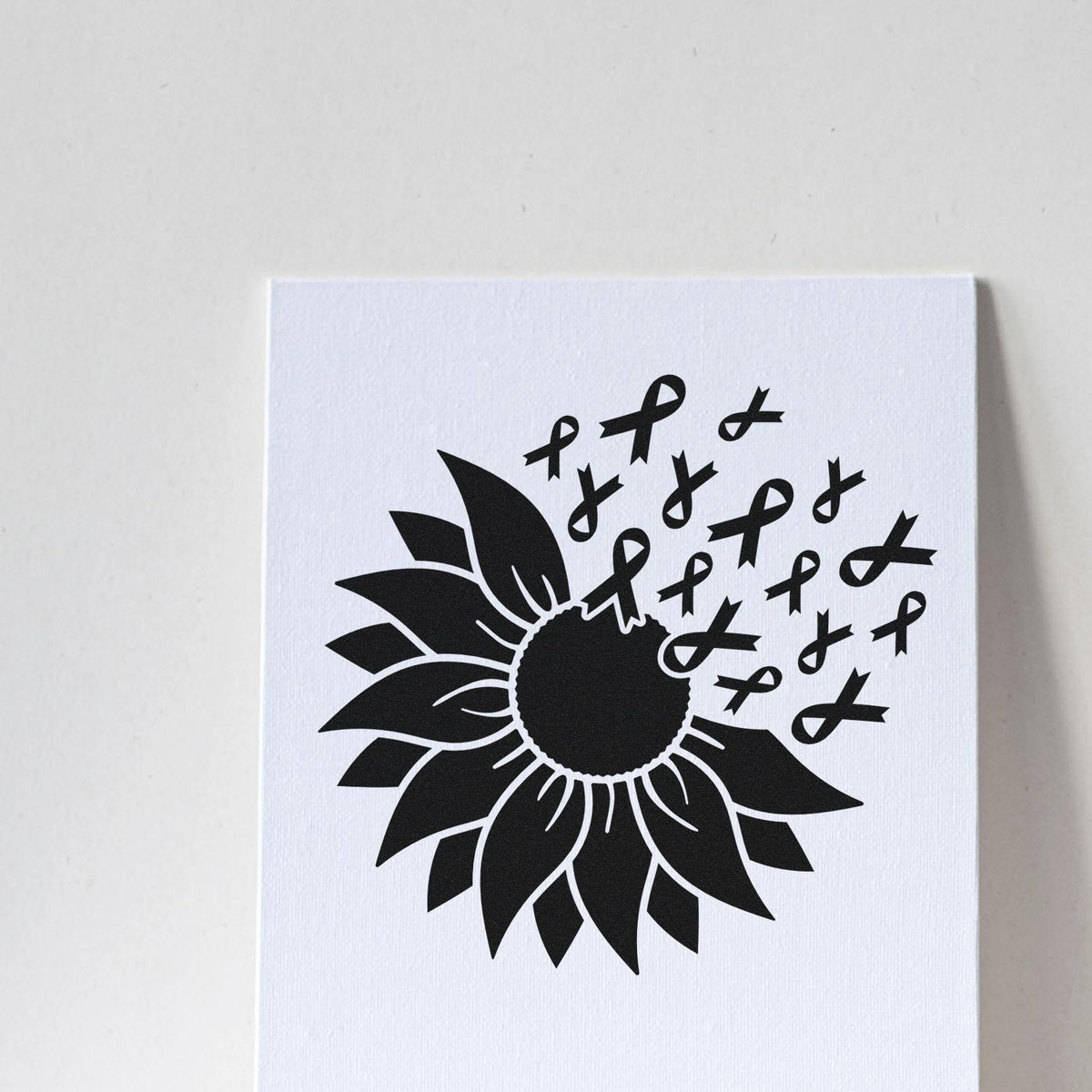 Black sunflower stamp with awareness ribbons on a white textured seal card