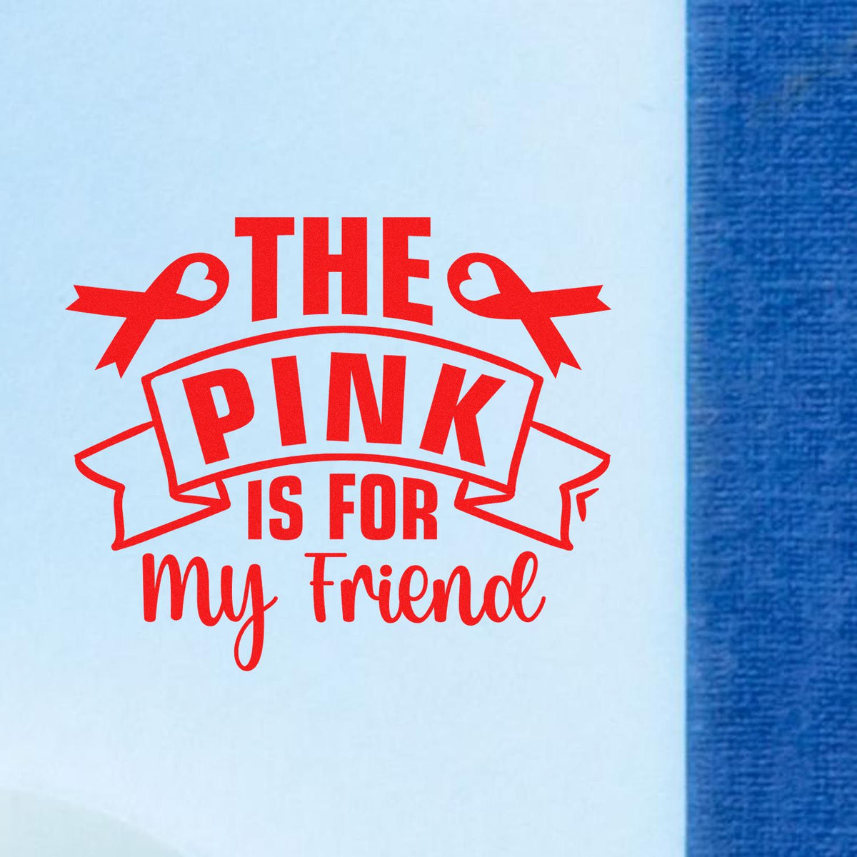 Red stamp-style seal with ribbon accents reading The Pink Is for My Friend on light blue paper.
