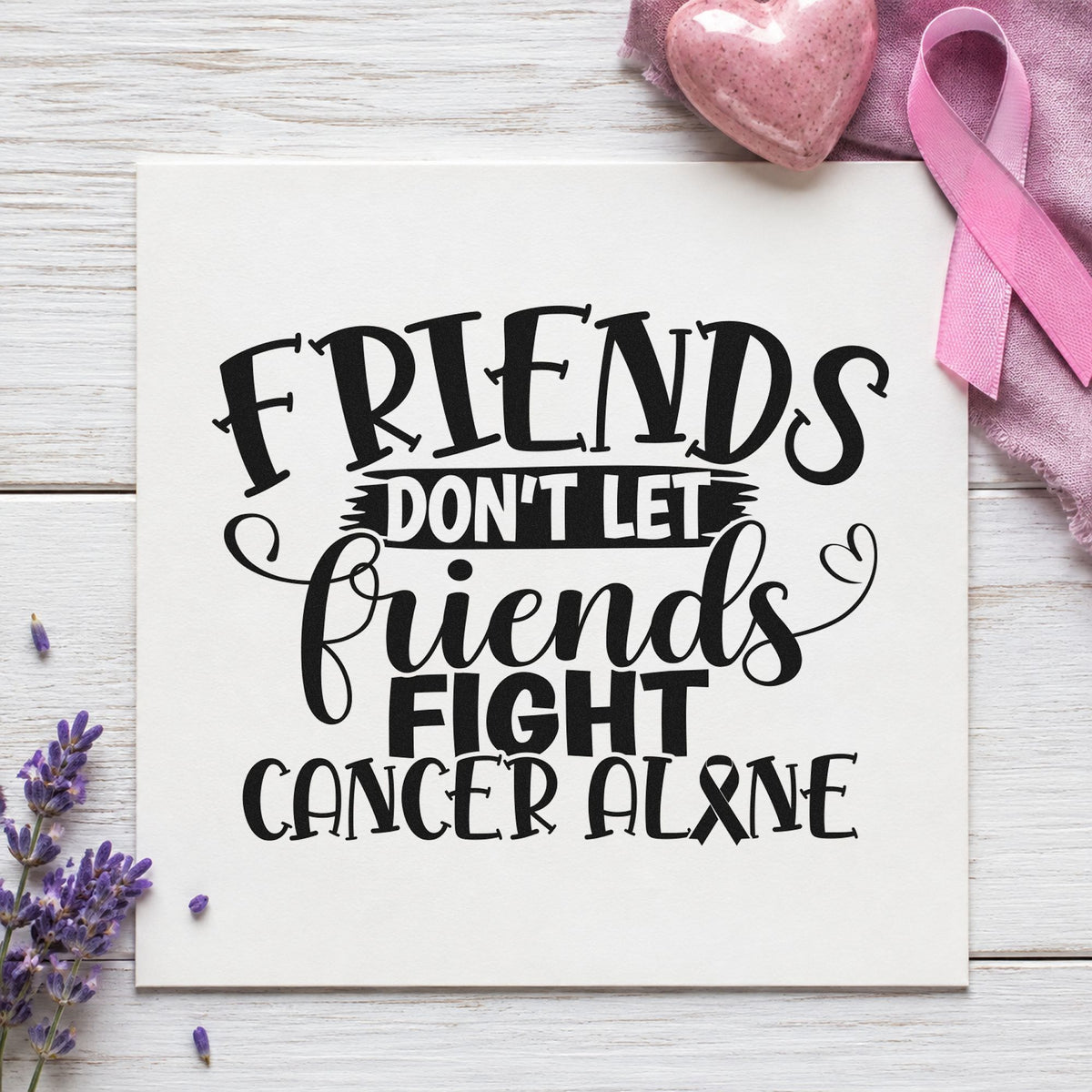 Friends Don't Fight Alone craft stamp imprint in black ink on a handmade project, one idea being meal train sign-ups.