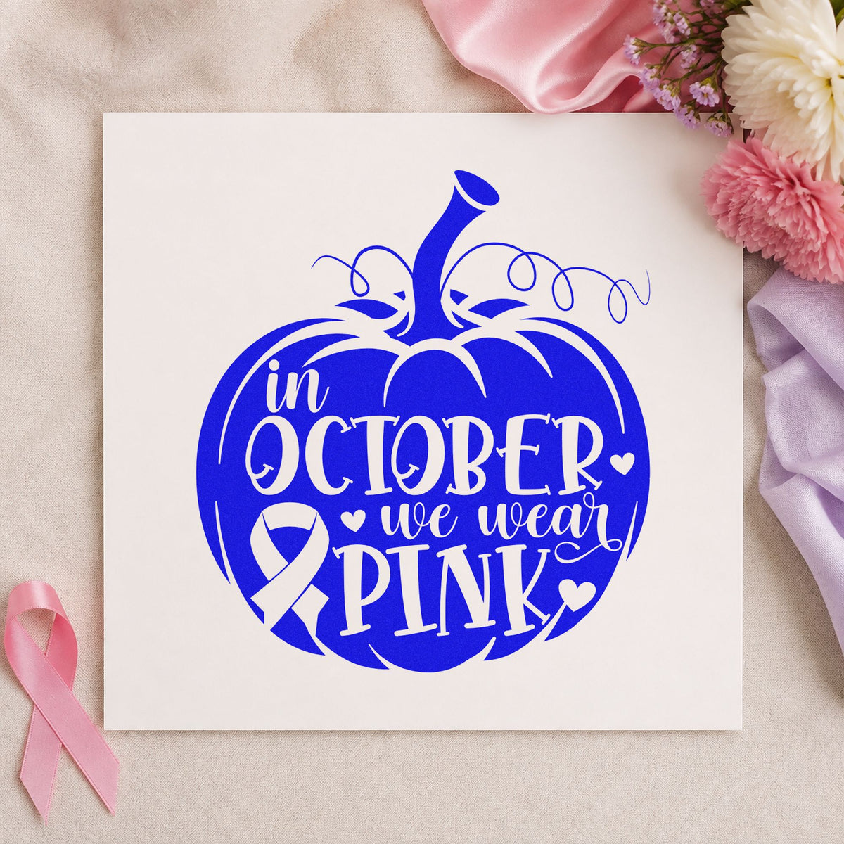 October Pink Pumpkin craft stamp in blue ink on cardstock, an easy option for scrapbook october pages.