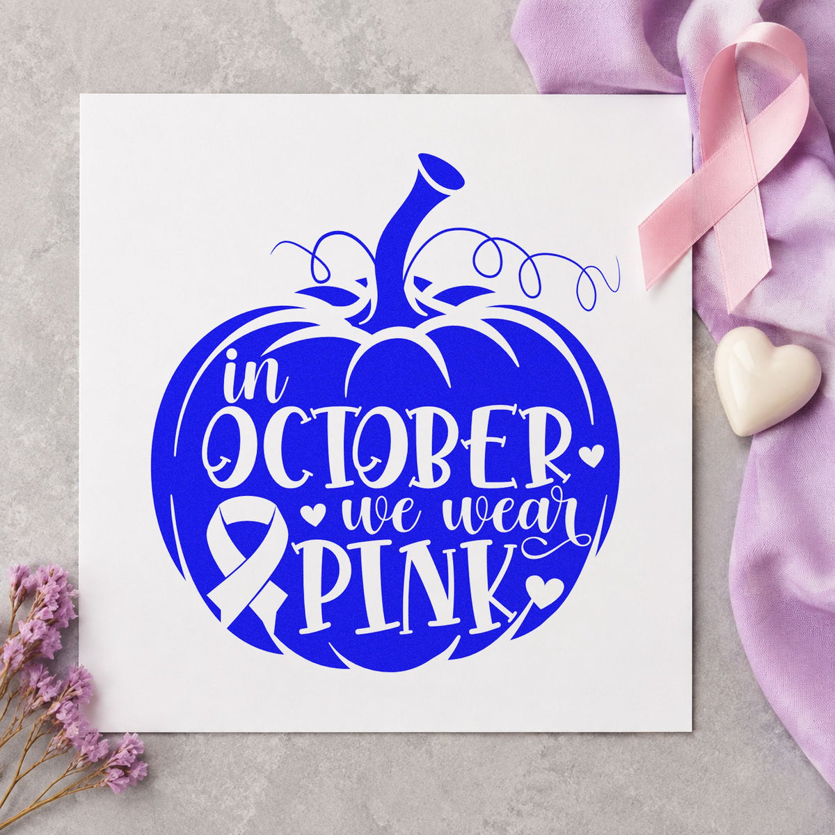 October Pink Pumpkin craft stamp imprinted in blue ink on paper, a design suited to fall tote bags.