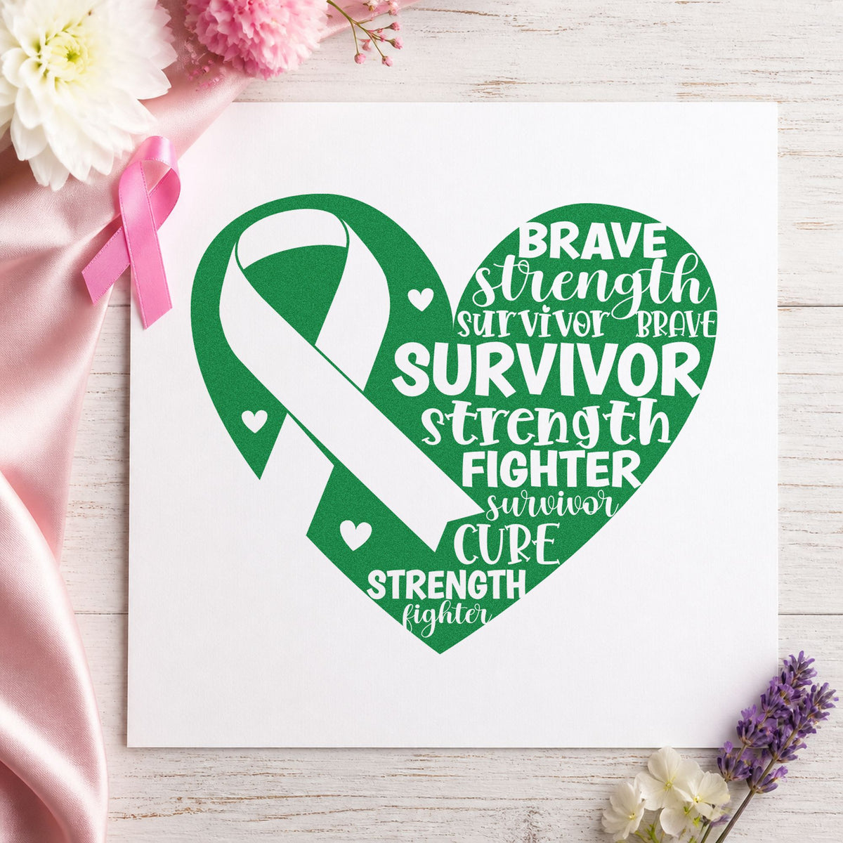 Survivor Ribbon Heart craft stamp imprint in green ink on a handmade project, one idea being journal cover stamping.