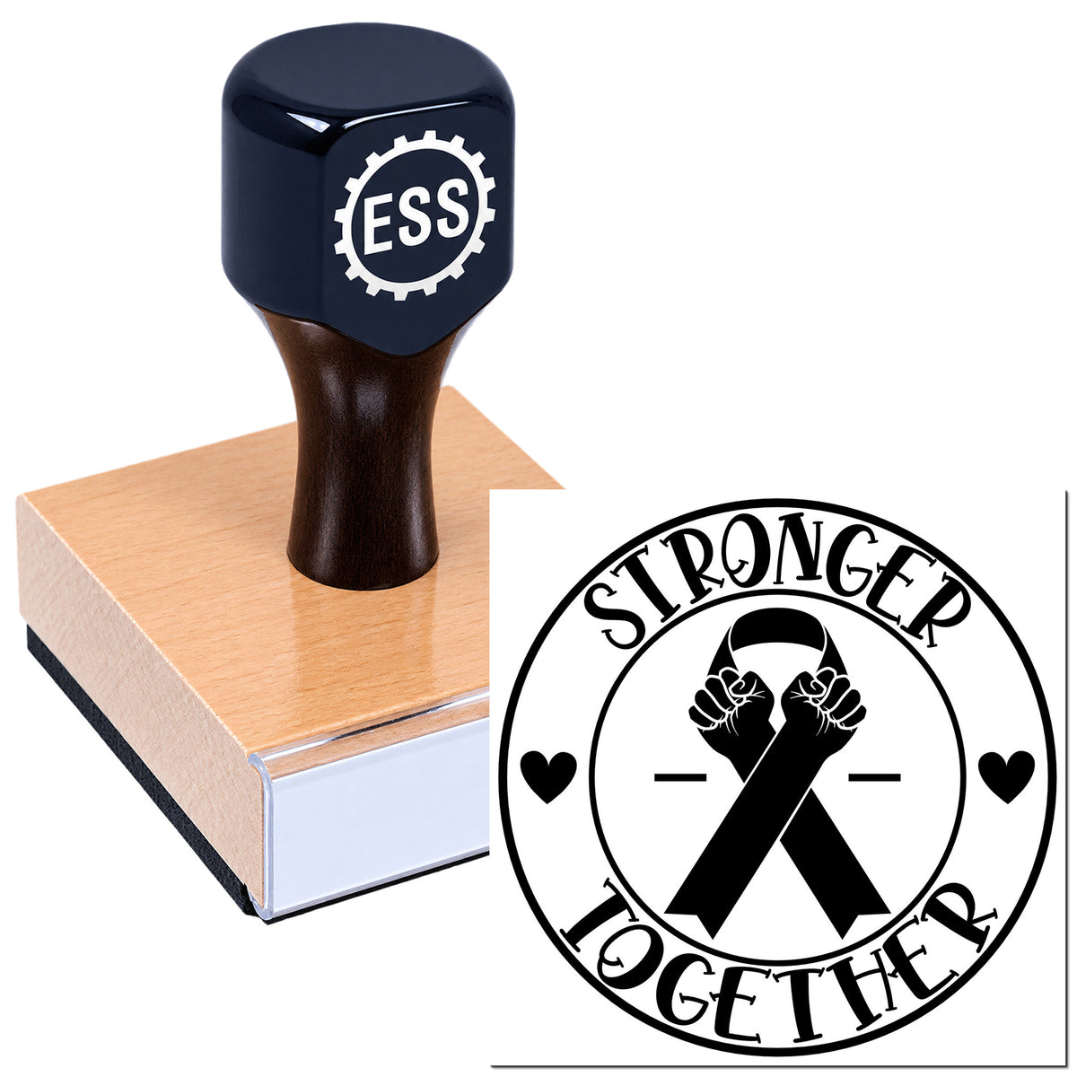 Black ESS rubber stamp on a wooden base beside a circular seal reading "Stronger Together" with ribboned fists and hearts.