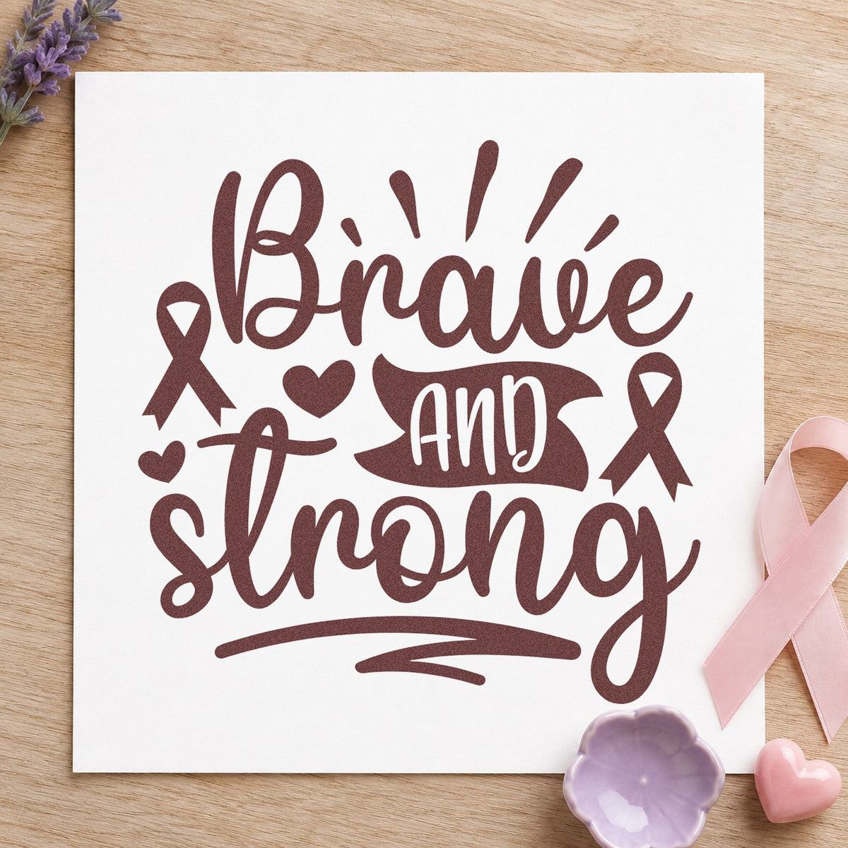 Brave and Strong Ribbons craft stamp imprint in brown ink on a handmade project, one idea being journal cover stamping.