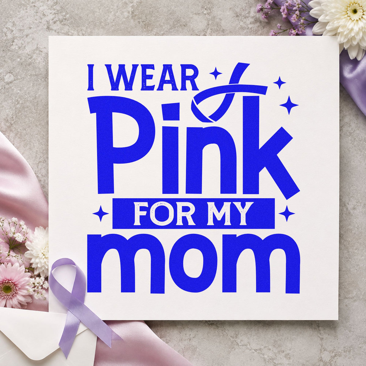 I Wear Pink for Mom craft stamp in blue ink on cardstock, an easy option for mother's day cards.