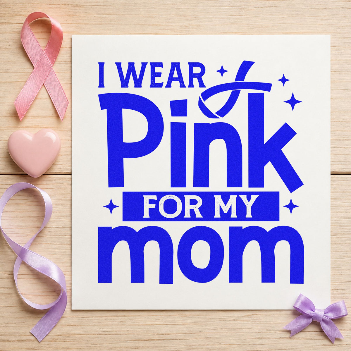 I Wear Pink for Mom craft stamp imprinted in blue ink on paper, a design suited to sports game signs.