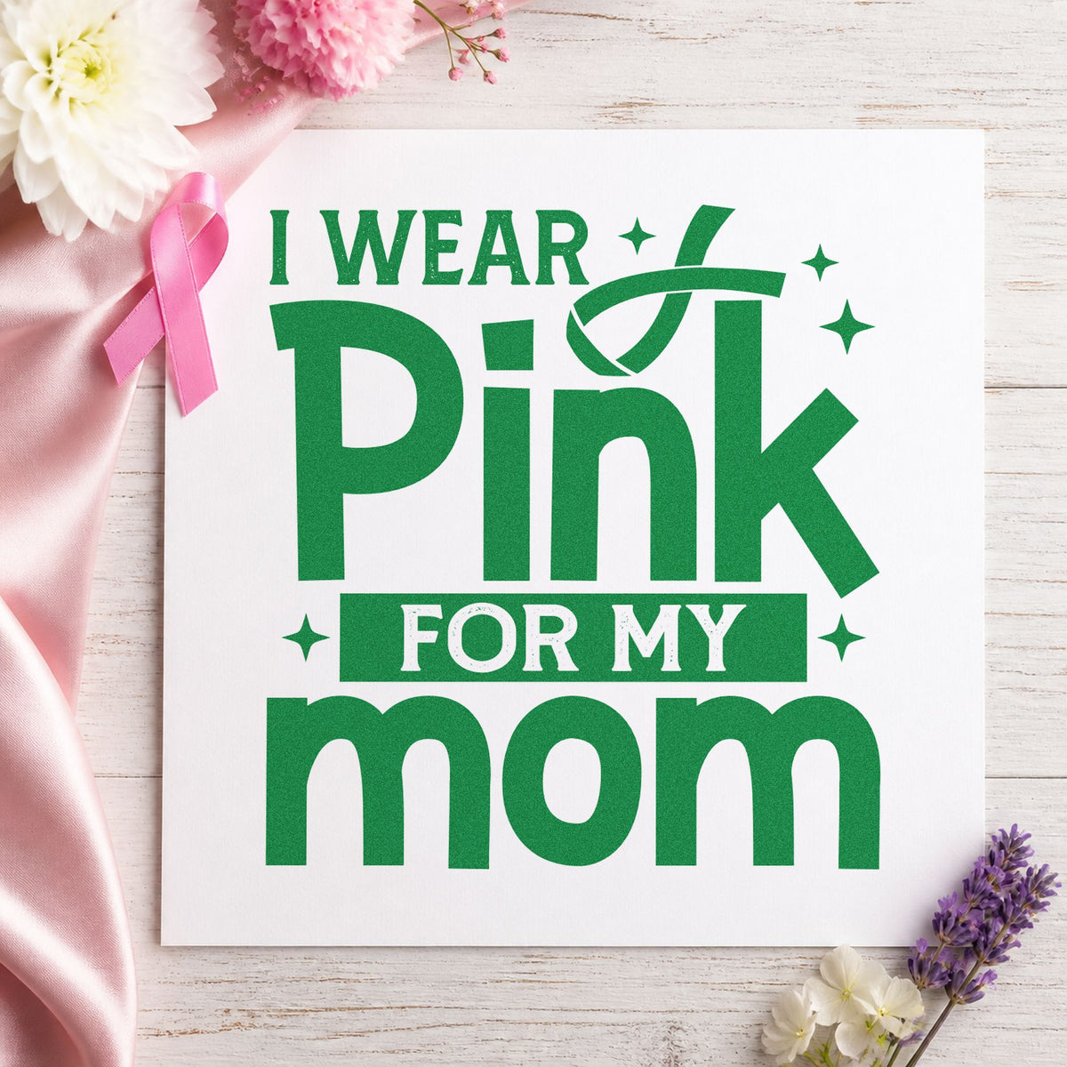 I Wear Pink for Mom craft stamp imprint in green ink on a handmade project, one idea being bedside photo frames.