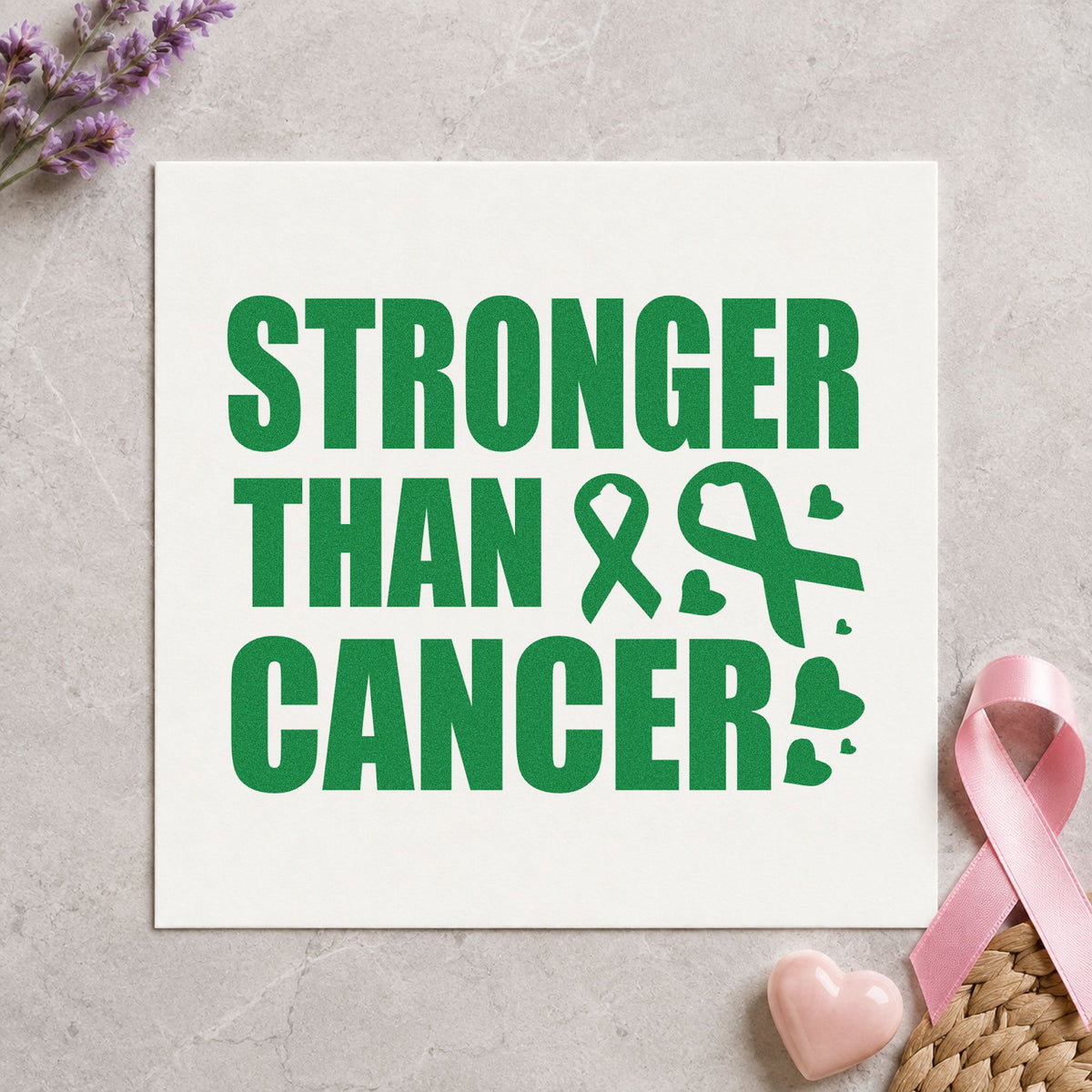 Stronger Than Cancer craft stamp in green ink on cardstock, an easy option for survivor walk shirts.