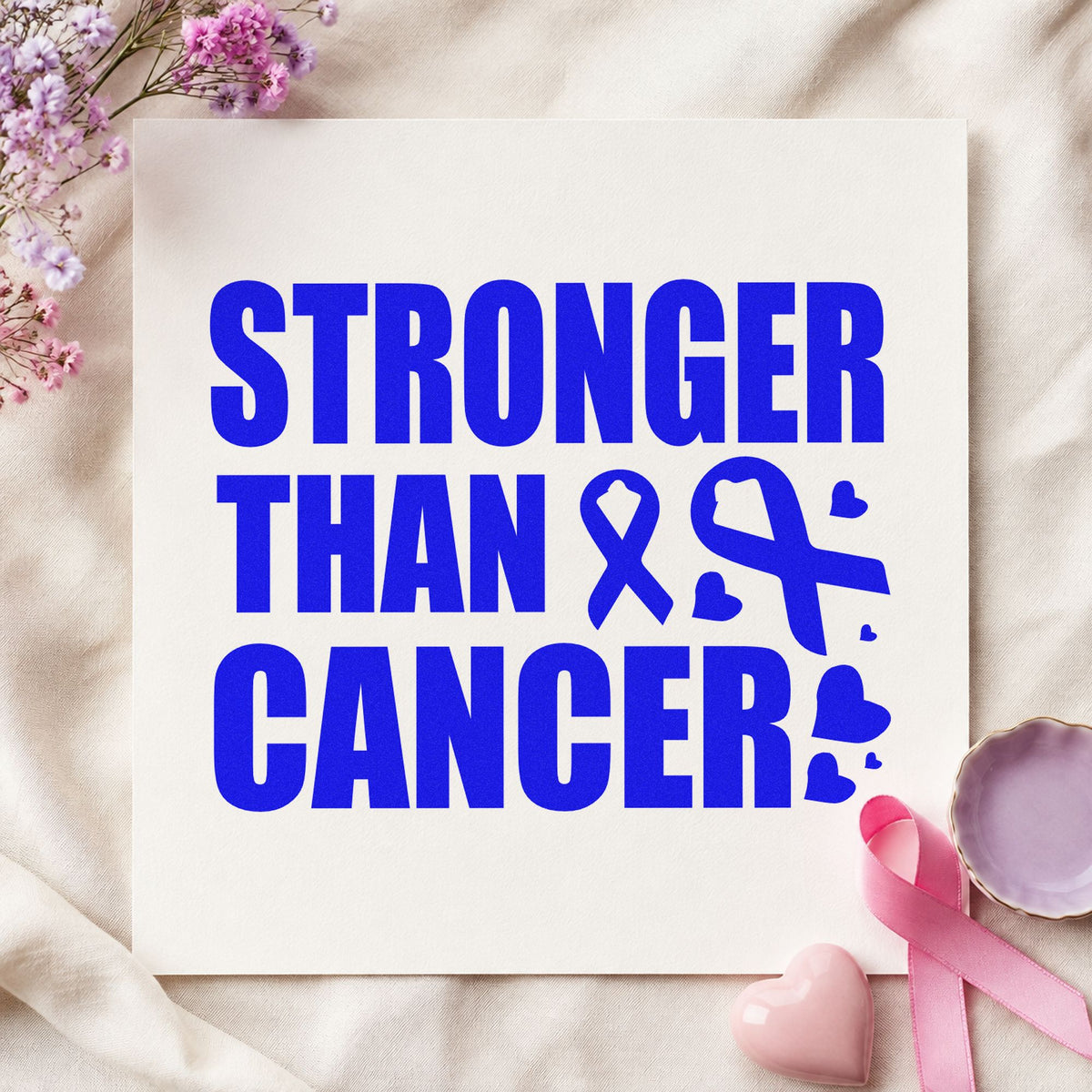 Stronger Than Cancer craft stamp imprinted in blue ink on paper, a design suited to care package tags.