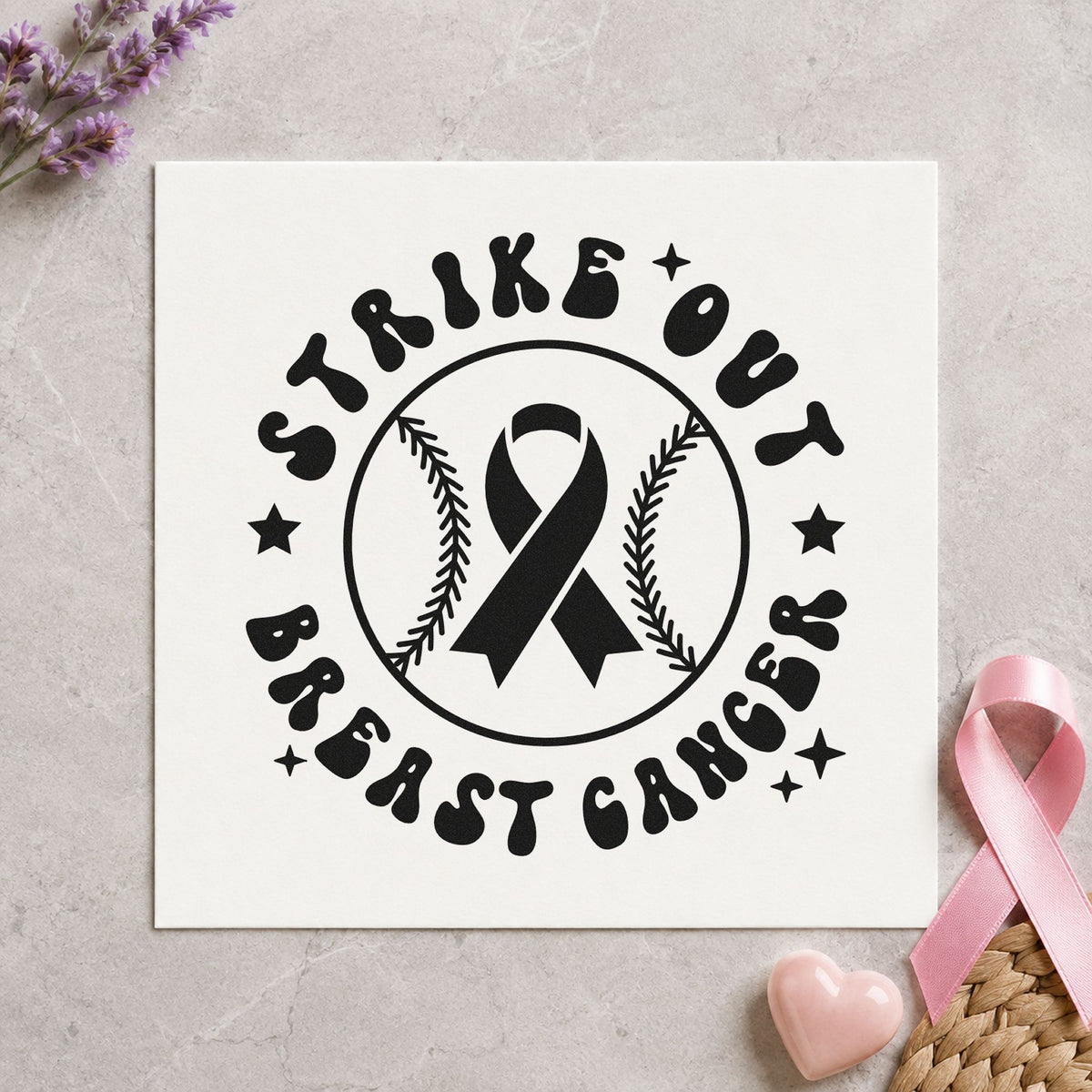 Strike Out Breast Cancer craft stamp imprint in black ink on a handmade project, one idea being dugout tribute signs.