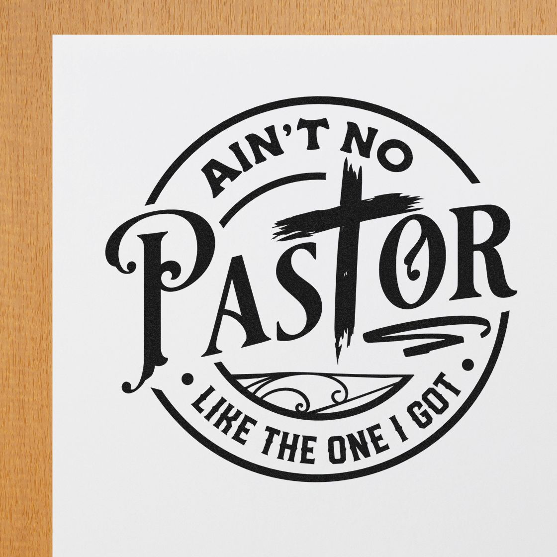 Black decorative stamp seal on white paper with AINT NO PASTOR LIKE THE ONE I GOT lettering.