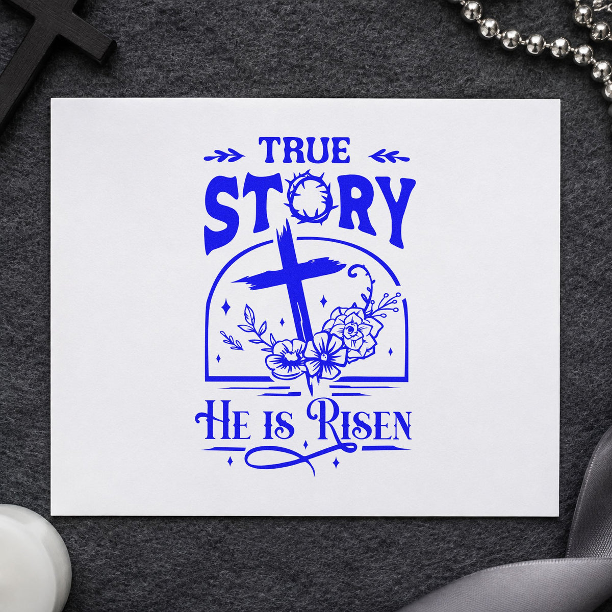 True Story Risen Arch craft stamp imprinted in blue ink on paper, a design suited to bible study invites.