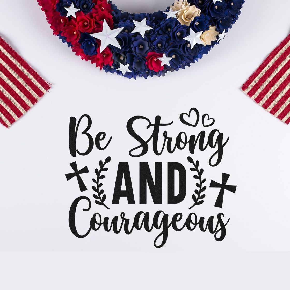 Black decorative stamp reading Be Strong and Courageous with patriotic red, white and blue floral seal and stars.