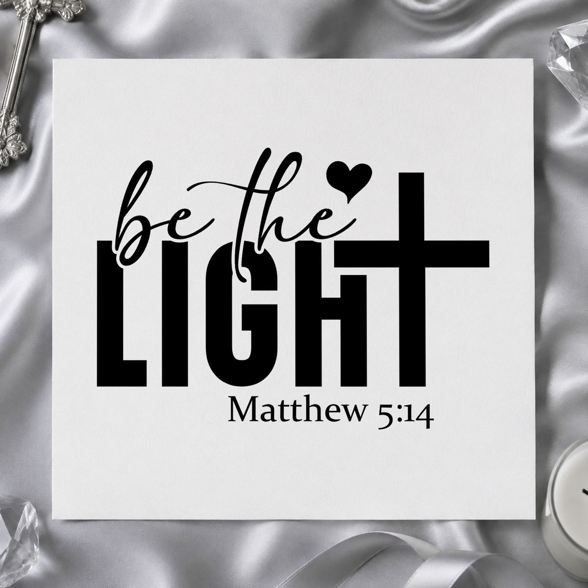 Be the Light craft stamp imprint in black ink on a handmade project, one idea being light gift tags.