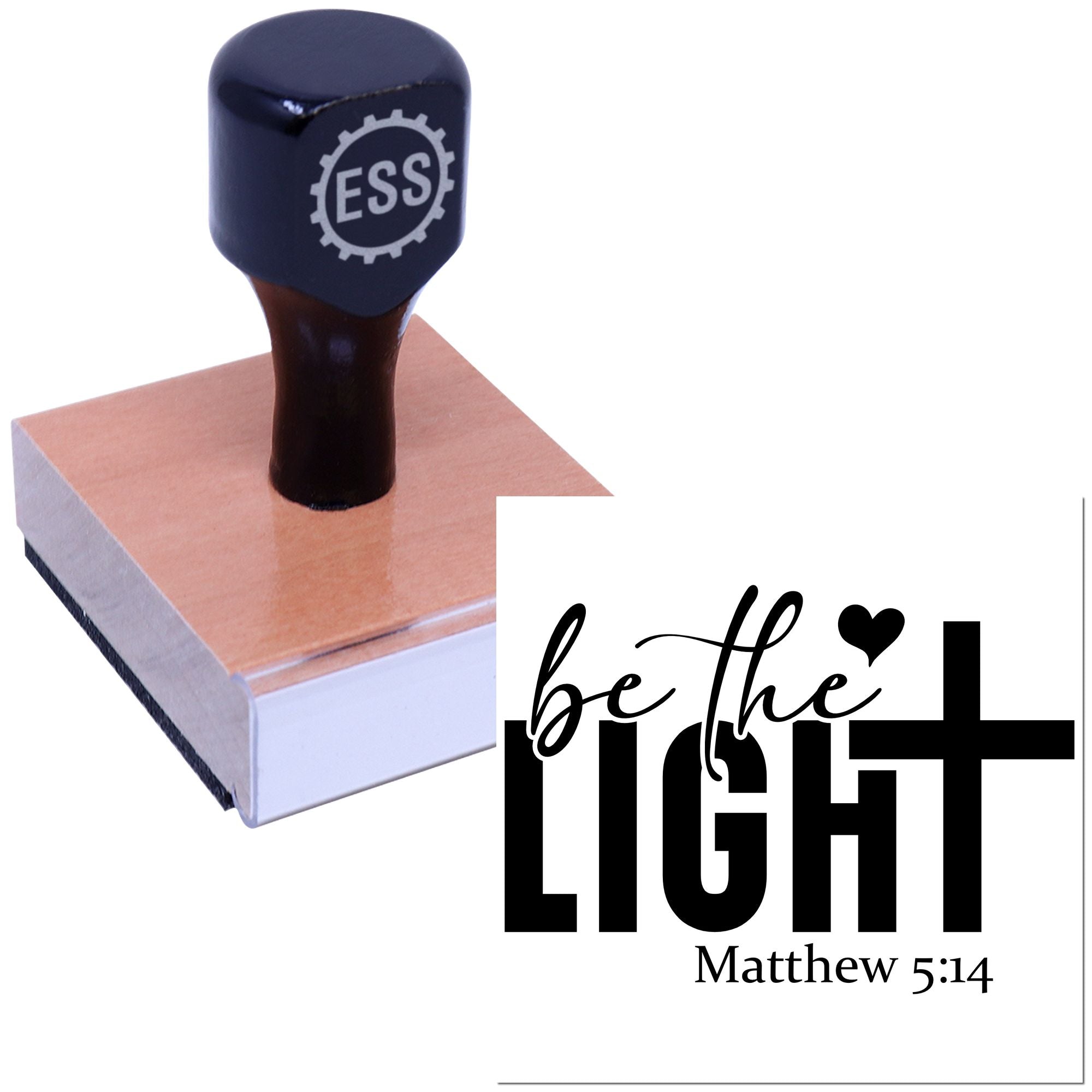Dark blue self-inking stamp and seal on pink pad, imprinting be the LIGHT with Matthew 5:14 in black.