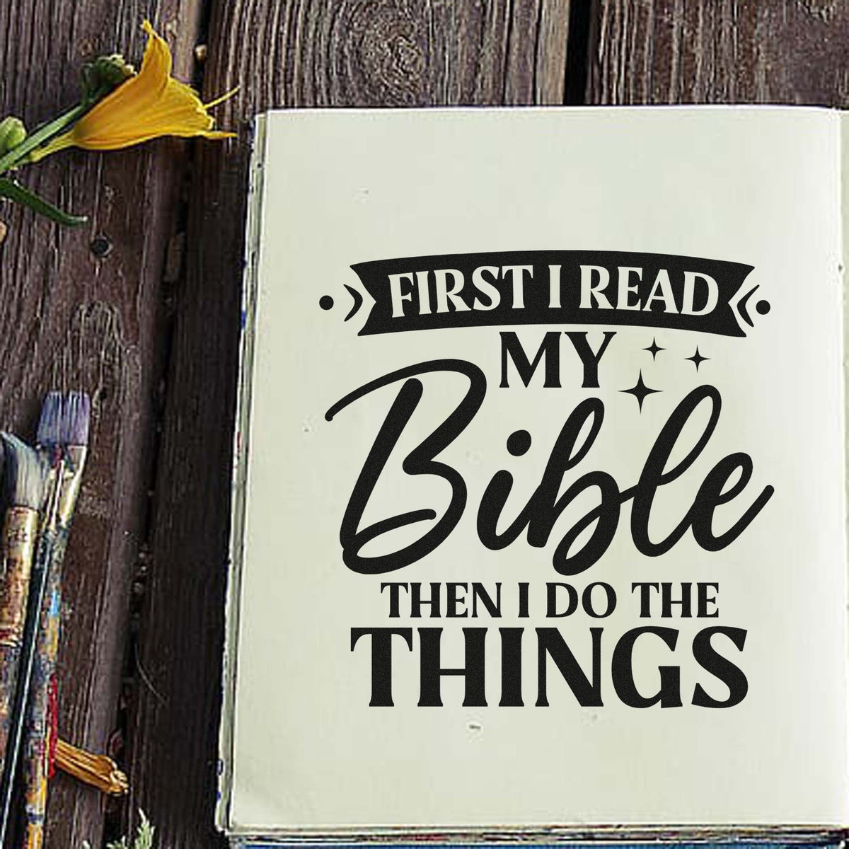 Cream journal page with a black Bible verse stamp, First I read my Bible then I do the things, beside a yellow flower.