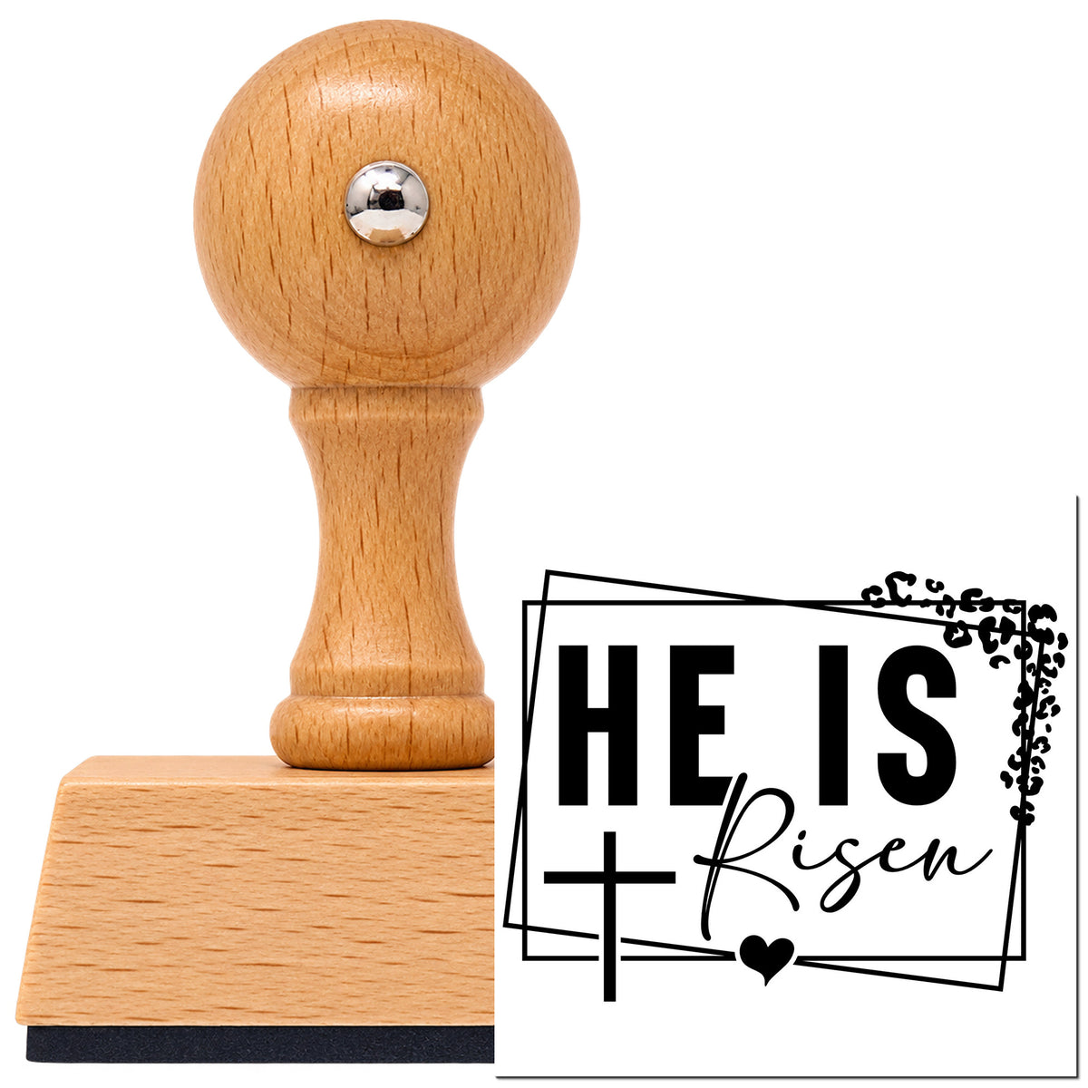 Vintage Pro beech wood stamp with a round knob handle, shown with its black He Is Risen Leafy Cross Frame imprint on white.