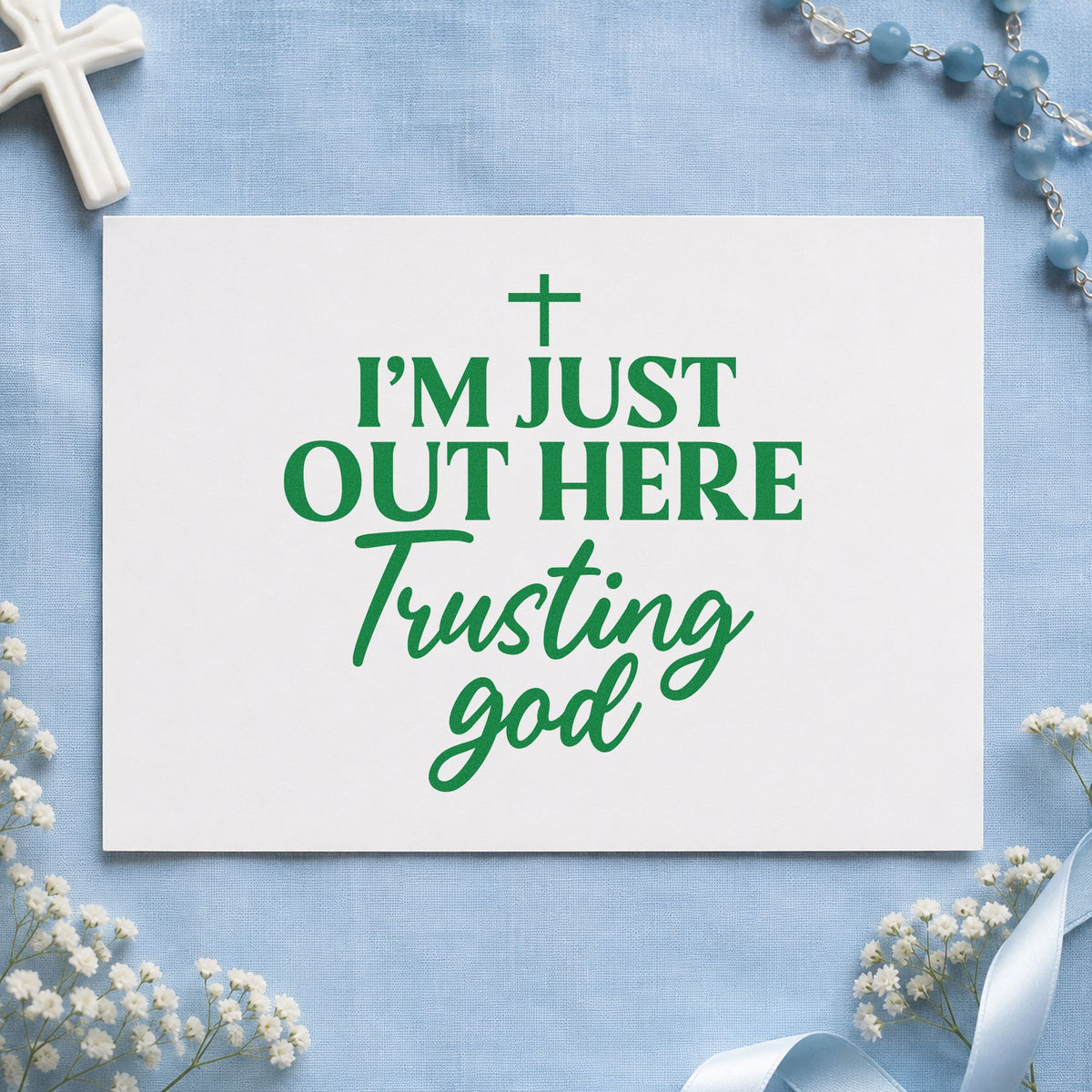 Out Here Trusting God craft stamp imprint in green ink on a handmade project, one idea being coffee mug gift tags.
