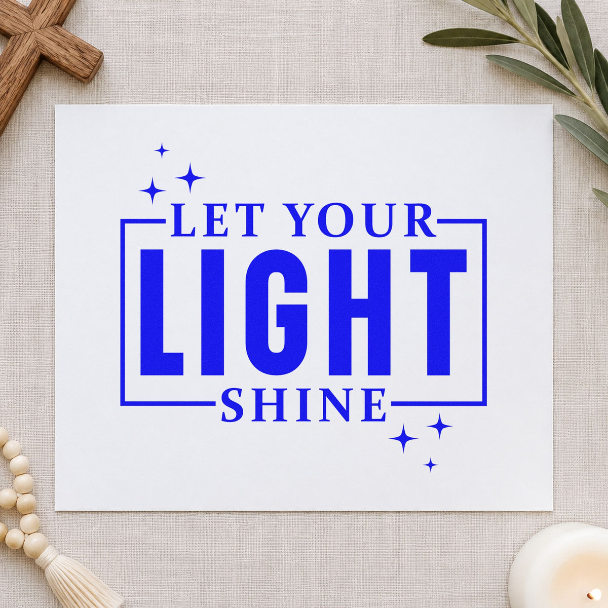 Let Your Light Shine craft stamp imprinted in blue ink on paper, a design suited to classroom bulletin boards.