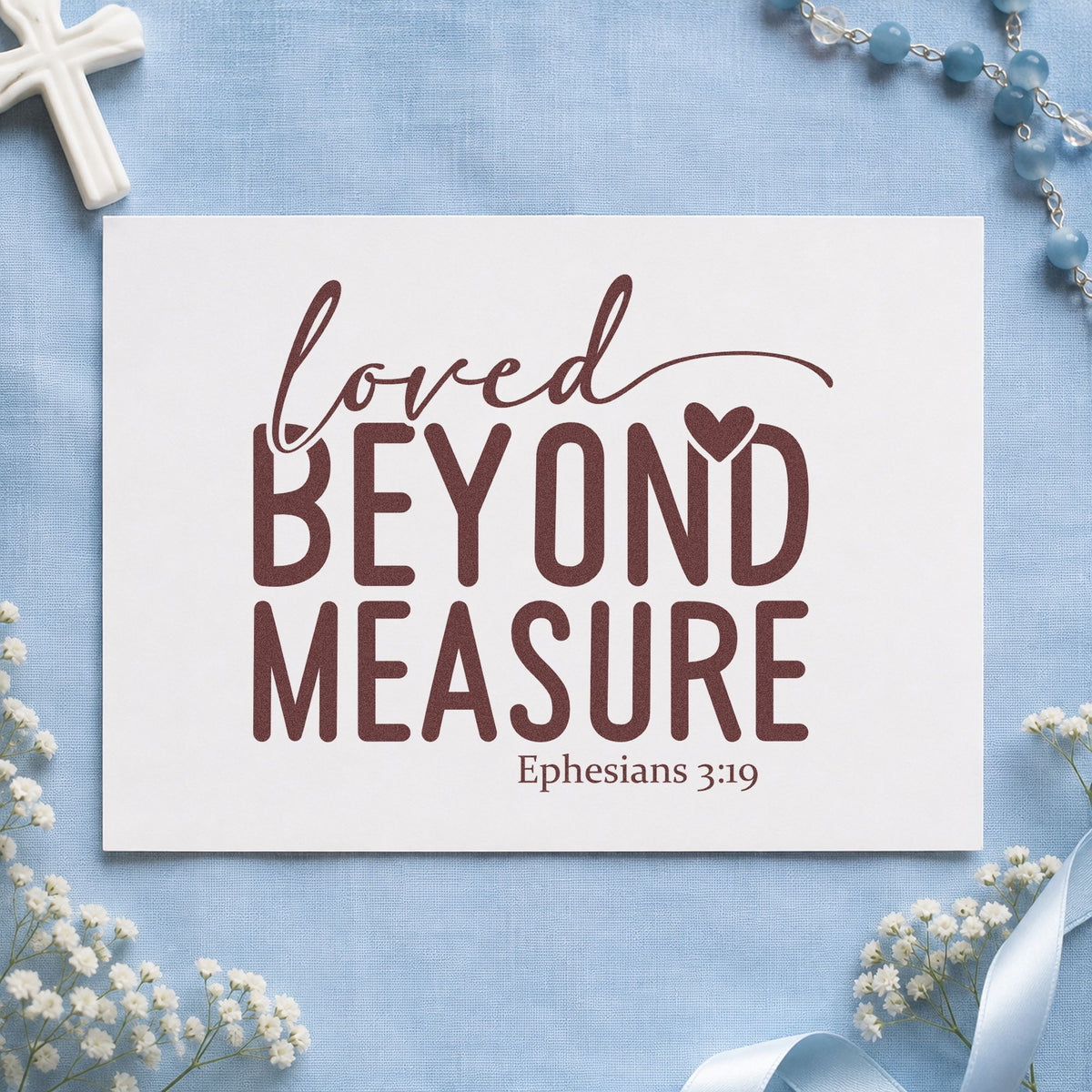 Loved Beyond Measure rubber stamp printed in brown ink, ready for scrapbook baby pages and similar paper crafts.
